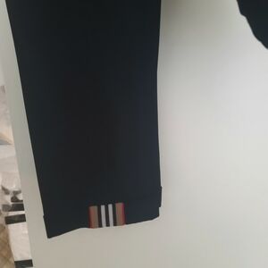 Black Track Pants with Red and White Stripes